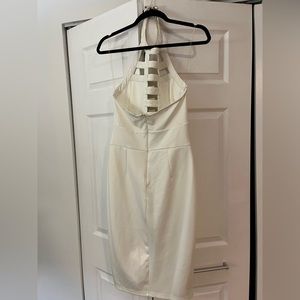 Miss Avenue Knockout off white with gold embellishments. Like new